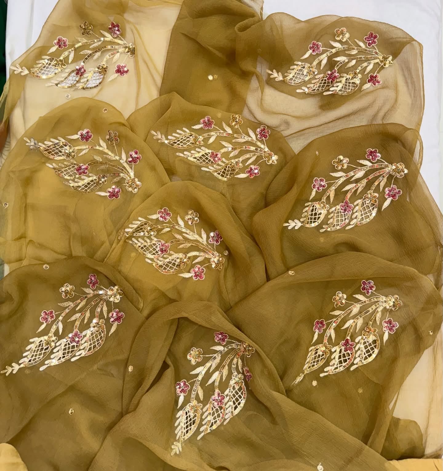 PURE CHIFFON SAREE EMBELLISHED WITH ZARDOZI WORK.