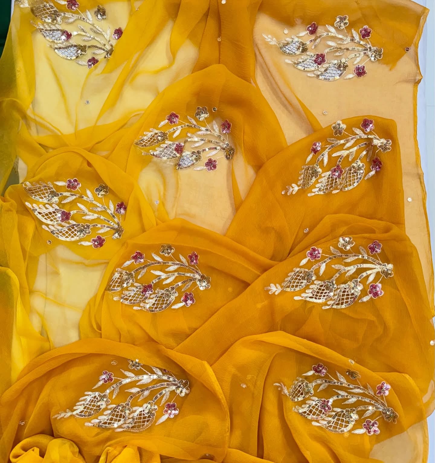 PURE CHIFFON SAREE EMBELLISHED WITH ZARDOZI WORK.