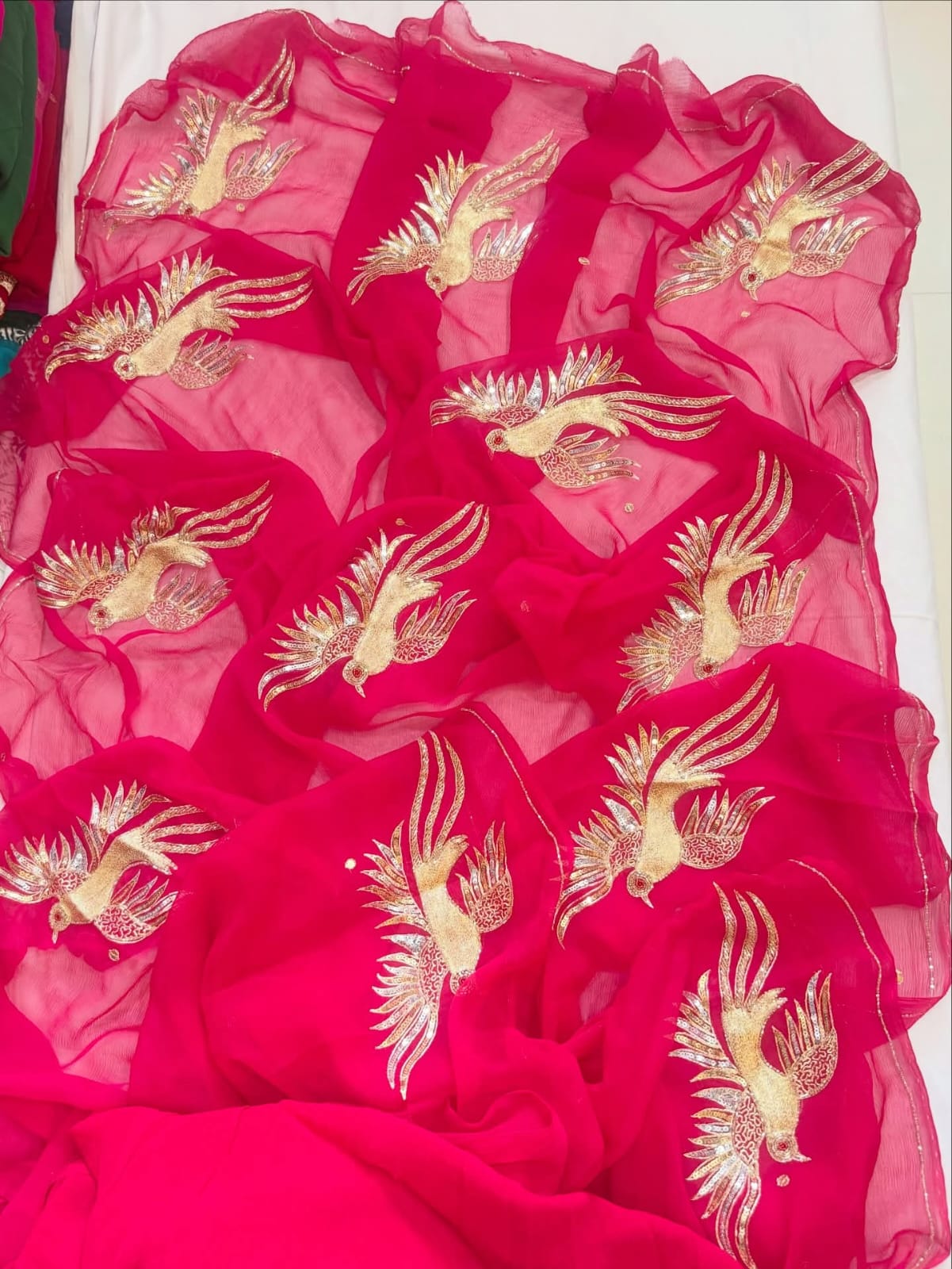 PURE CHIFFON SAREE EMBELLISHED WITH ZARDOZI WORK.