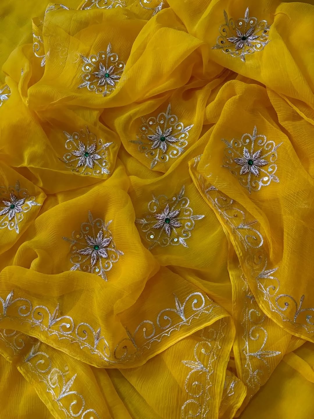 PURE DIAMOND CHIFFON  HANDCRAFTED ZARI AND GOTA WORA SAREE .