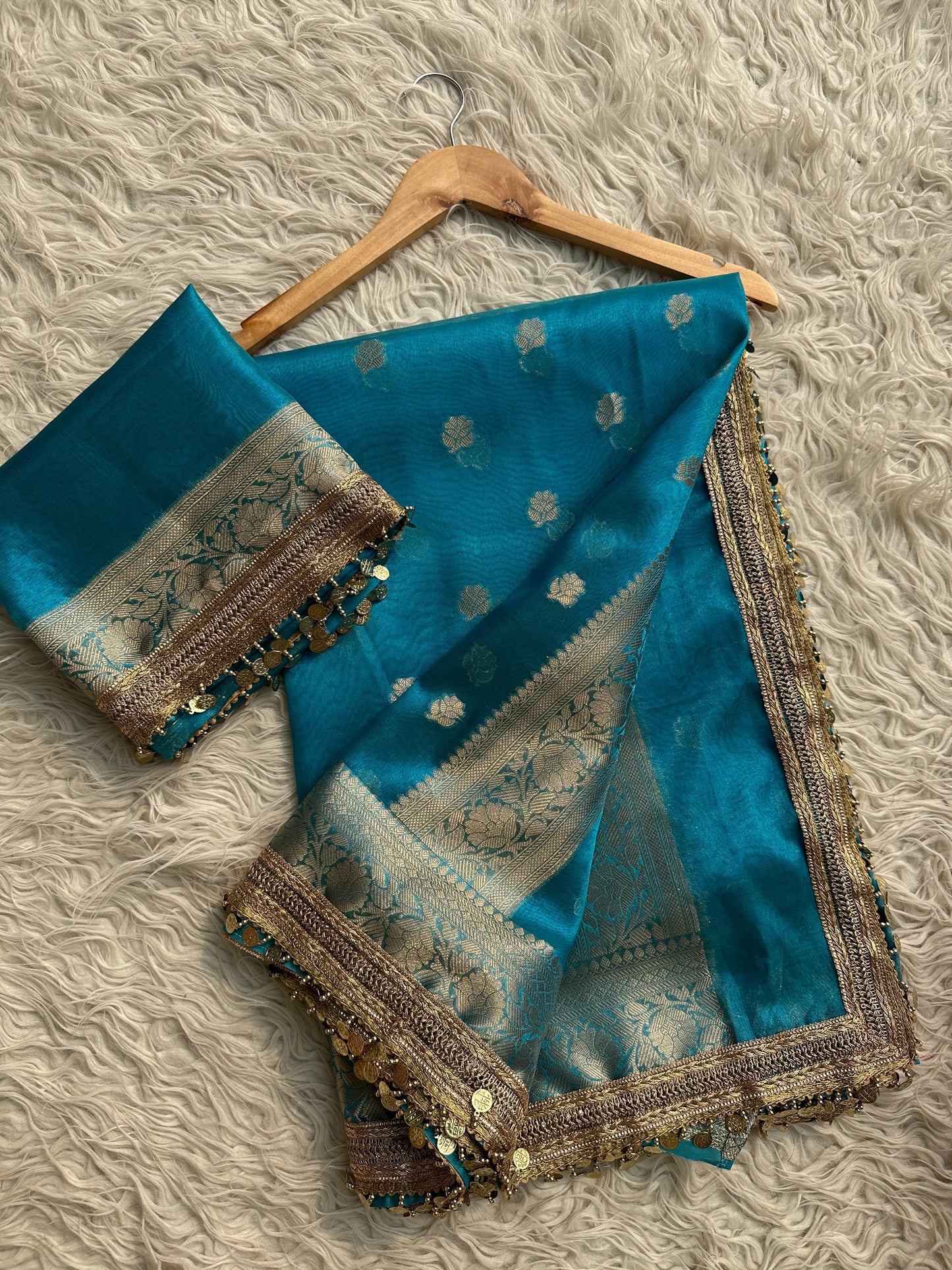 Banarasi most trending tissue Saree With beautiful coins lace.