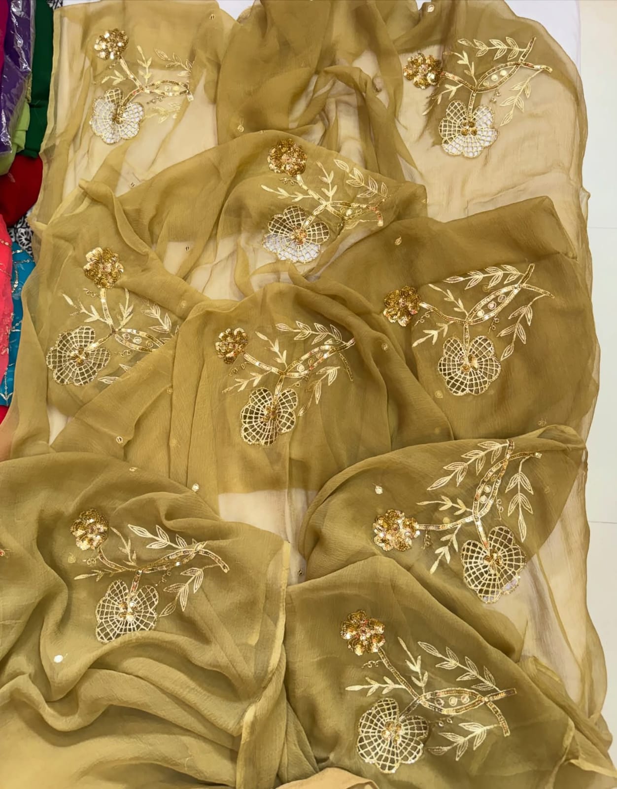 PURE CHIFFON SAREE EMBELLISHED WITH ZARDOZI WORK.