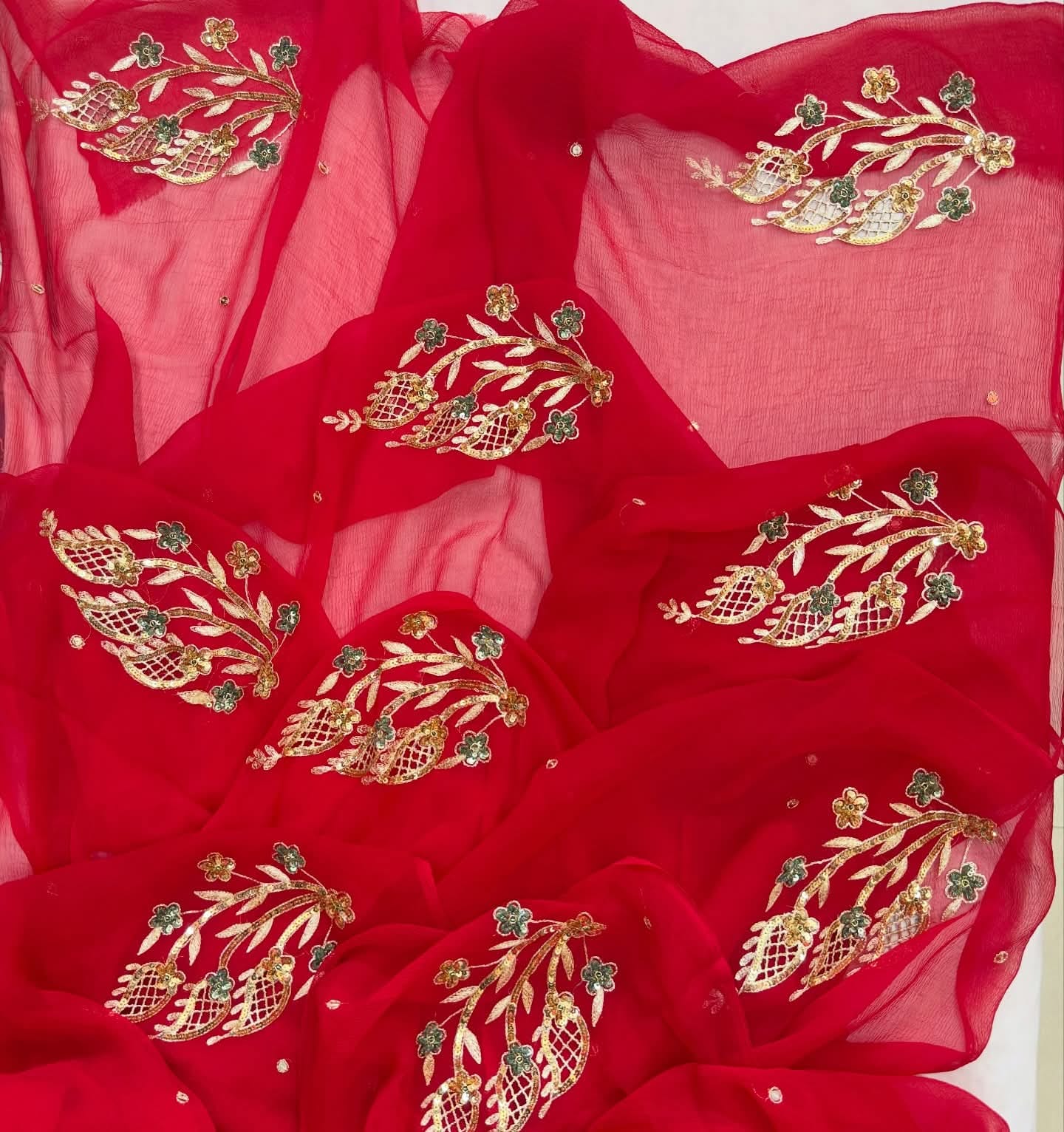 PURE CHIFFON SAREE EMBELLISHED WITH ZARDOZI WORK.