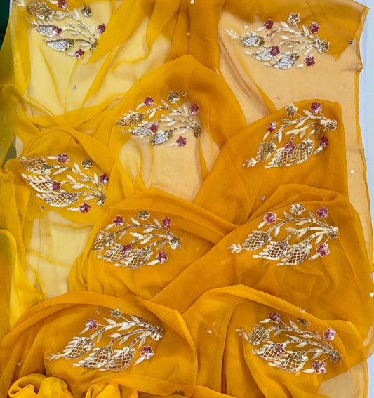 PURE CHIFFON SAREE EMBELLISHED WITH ZARDOZI WORK.