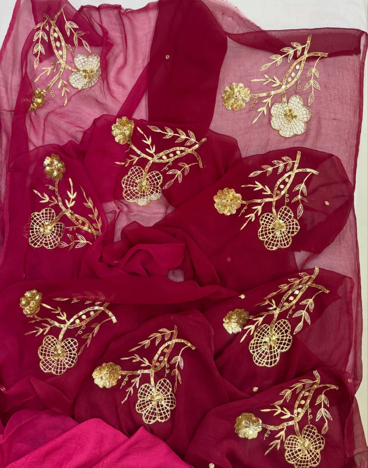 PURE CHIFFON SAREE EMBELLISHED WITH ZARDOZI WORK.