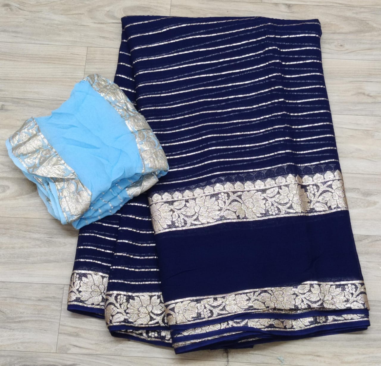 Pure Georgette Zari Weaving Saree with Blouse.