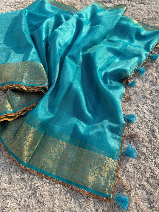 Banarasi Tissue Silk Saree with Heavy Lace Work.