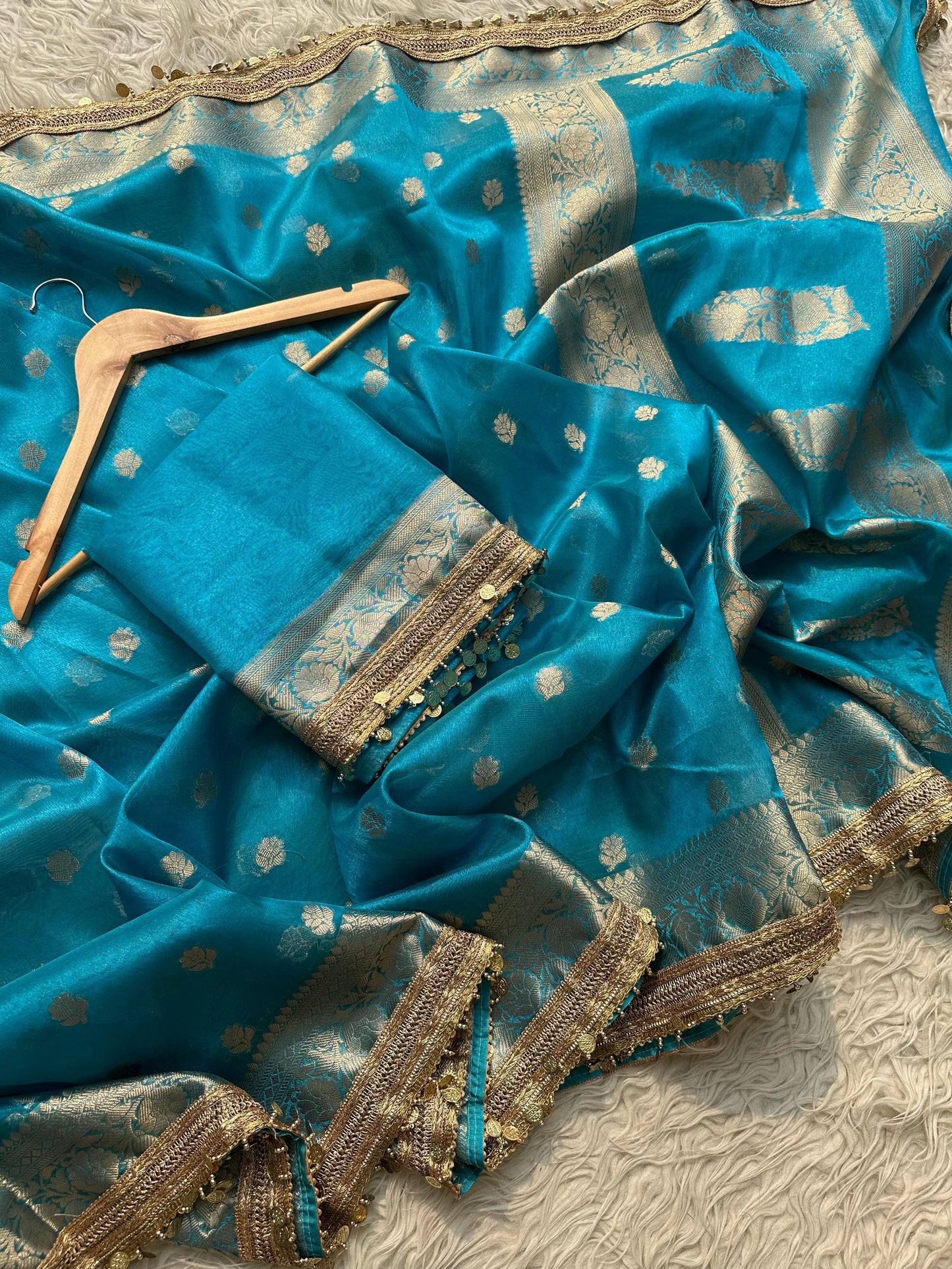 Banarasi most trending tissue Saree With beautiful coins lace.