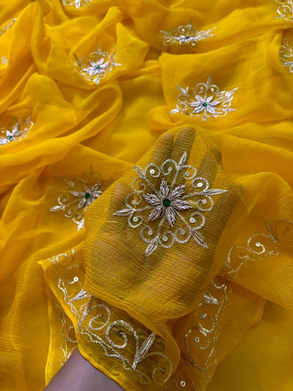 PURE DIAMOND CHIFFON  HANDCRAFTED ZARI AND GOTA WORA SAREE .